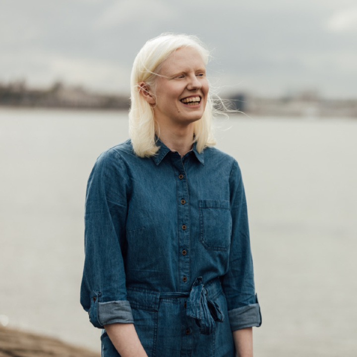 Ellen Renton infront of the ocean
